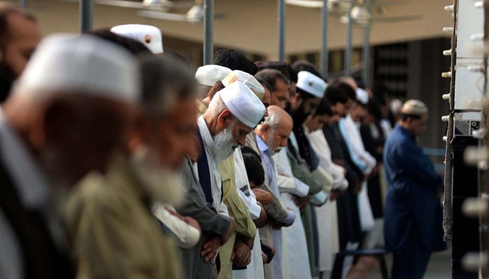 People offer Eid-ul-Fitr prayers at a mosque in Rawalpindi in this image released on April 12, 2024. — PPI