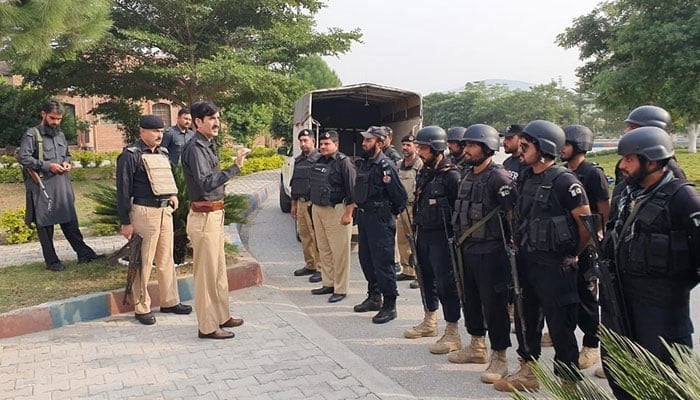 KP police officer interacts with the personnel in this image released on November 8, 2023. — Facebook/Khyber Pakhtunkhwa Police