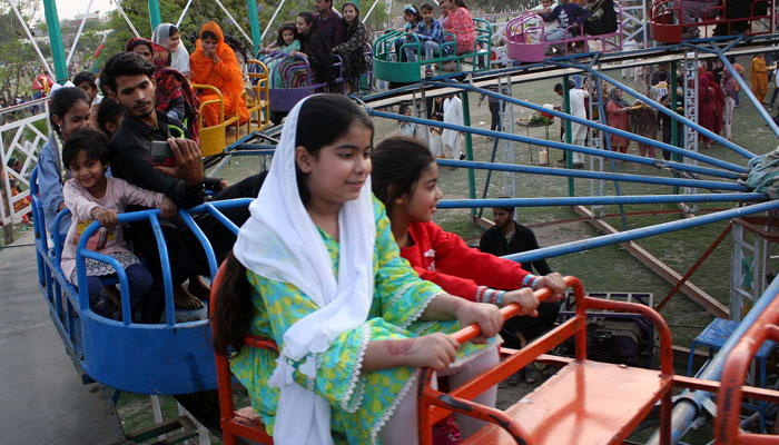 People gather to enjoy Eid festivities on the third day of Eid- ul-Fitar on April 12, 2024. — PPI