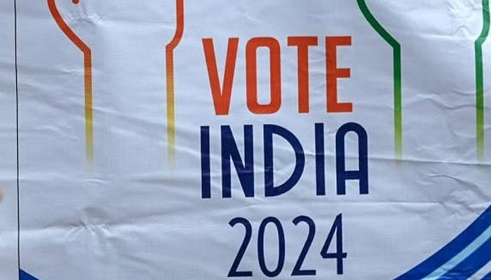 This picture shows the banner with the inscription Vote India 2024. — AFP/File