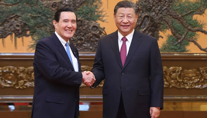Chinese leader Xi Jinping shakes hands with former Taiwan president Ma Ying-jeou at the Great Hall of the People in Beijing on April 10, 2024. — Xinhua