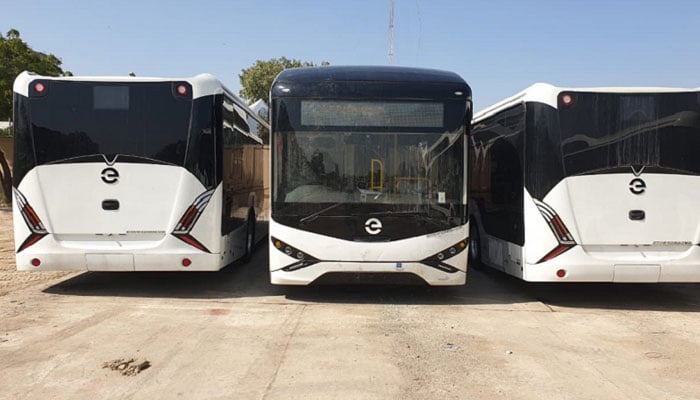 A representational image showing electric buses parked at a site. — APP/File