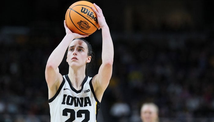 Caitlin Clark (22) of the Iowa Hawkeyes shoots the ball in the Elite 8 round of the NCAA Womens Basketball Tournament on April 01, 2024. — AFP