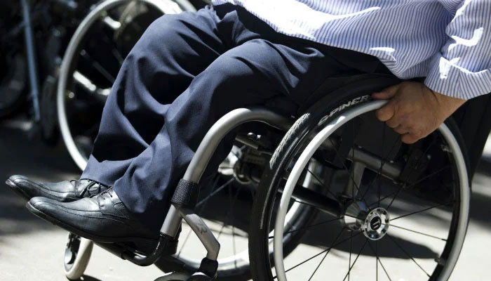 This representational image shows a Parkinsons patient on a wheelchair. — AFP/File
