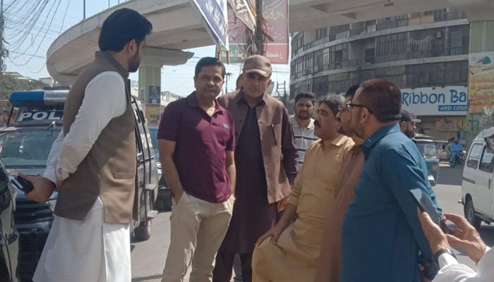 Newly appointed Karachi commissioner Syed Hasan Naqvi (2nd L) inspects the cleanliness situation along with others in Karachi on April 12, 2024. — Facebook/Sindh Solid Waste Management Board Official