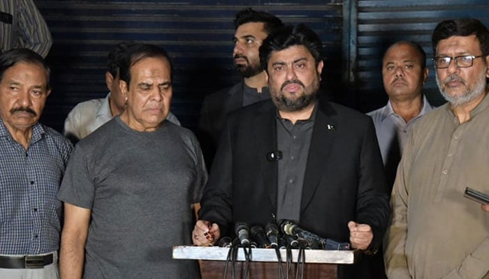 Sindh Governor Kamran Khan Tessori (centre) speaks to the media after meeting deceased Turab Zahidis father (second left) in this image on April 14, 2024. — Facebook/Kamran Tessori