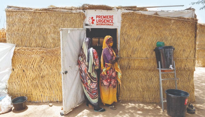 Sudanese refugees at a health center in the Koufroun refugee camp. — AFP/File