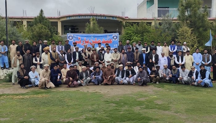 Participants pose for a group photo at an Eid Milan party at Ummah Children Academy organized by Wana on April 13, 2024. — Facebook/WAWA- Wana Welfare Association Official