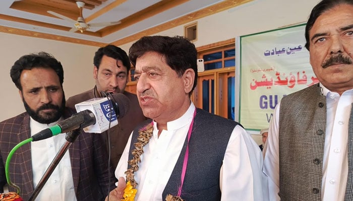 Khyber Pakhtunkhwa Minister for Food Zahir Shah Toru speaks at an event organised by the Gujjar Welfare Foundation in Mardan district on April 14, 2024. — Facebook/Zahir Shah Toru