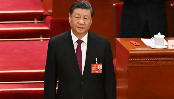 Chinas President Xi Jinping arrives for the third plenary session of the National Peoples Congress (NPC) at the Great Hall of the People in Beijing on March 10, 2023. — AFP