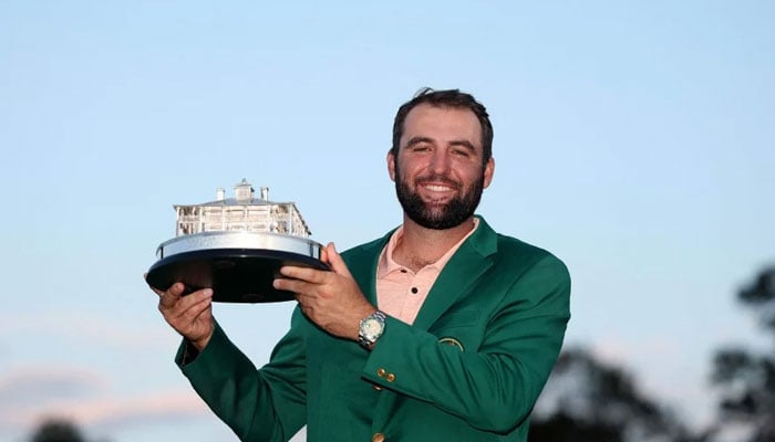 Scottie Scheffler of the United States poses with the Masters trophy after winning the 2024 Masters Tournament at Augusta National Golf Club on April 14, 2024. — AFP/File