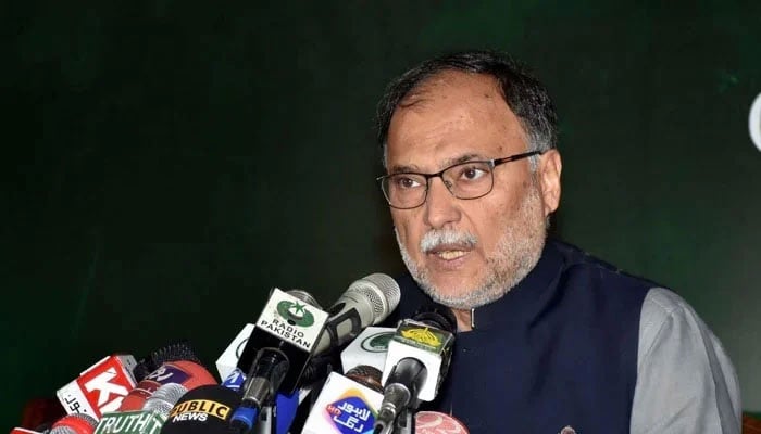 Minister for Planning and Development Ahsan Iqbal addressing the media in Lahore. — PID/File