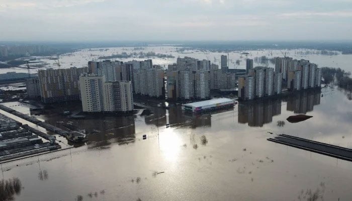 An aerial view shows the flood-hit city of Orenburg on April 13, 2024. — AFP