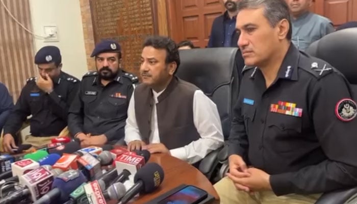 In this screengrab, Sindh Home Minister Ziaul Hasan Lanjar (C) speaks to the media persons along with IG Sindh Ghulam Nabi Memon (R) during a visit to Shikarpur and Kandhkot districts on April 15, 2024. — Facebook/Shahub Din Mallah