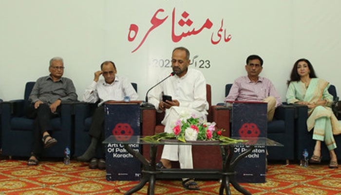 This representational image shows speakers reading their poetry during a session of the Aalmi Mushaira. — Arts Council of Pakistan Karachi Website/File