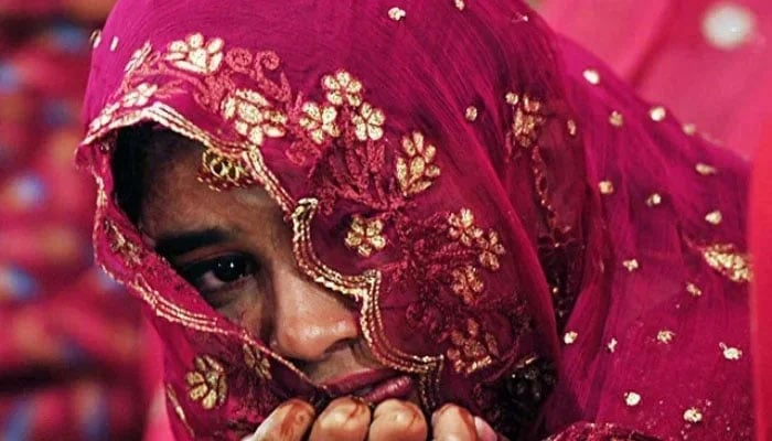 A bride in a mass wedding ceremony in Karachi. — AFP/File