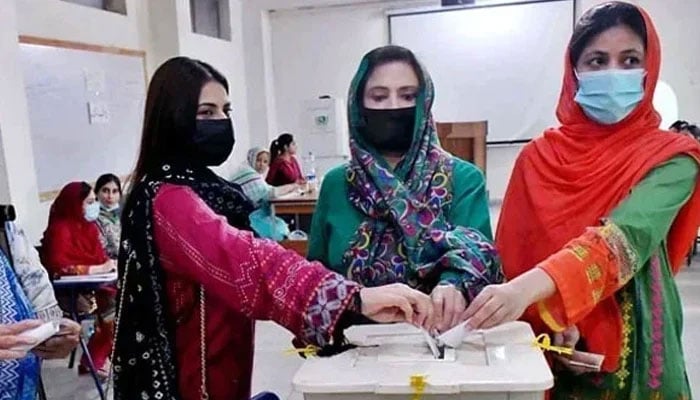A representational image of young female voters casting their votes. — APP/File