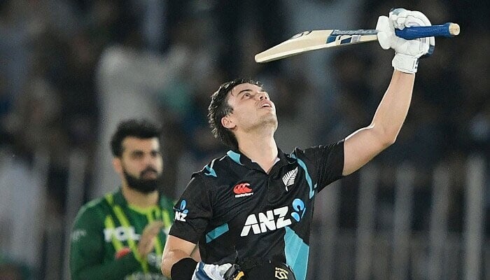 New Zealand’s Mark Chapman (R) celebrates after scoring a century in T20I against Pakistan at the Rawalpindi Cricket Stadium. — AFP/File