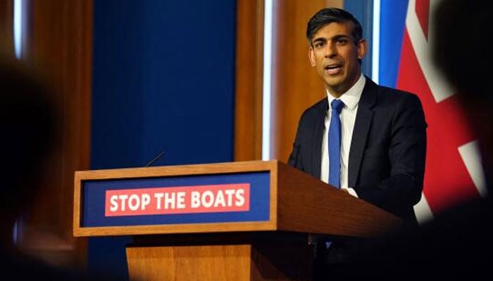 Britains Prime Minister Rishi Sunak hosts a press conference inside the Downing Street Briefing Room, in central London, on December 7, 2023. — AFP