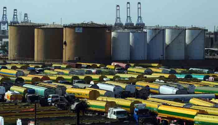 Oil tankers parked near Shireen Jinnah Colony in Karachi. — APP/File