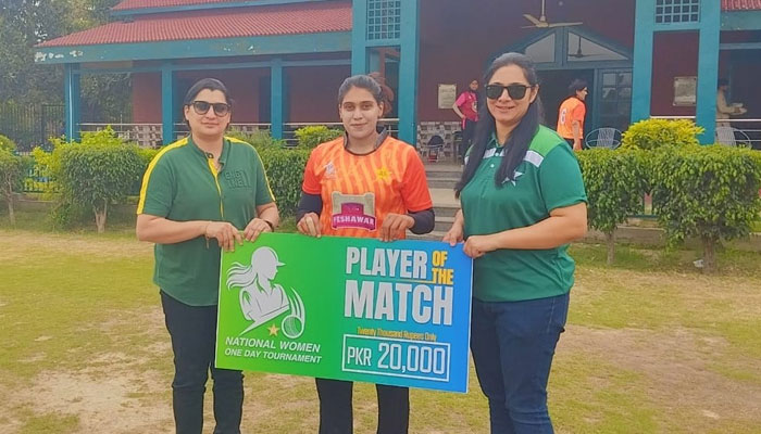 This image released on April 17, 2024, shows Peshawars opener Ayesha Zafar holding a player of the match prize cheque. — Facebook/Pakistan Cricket Team