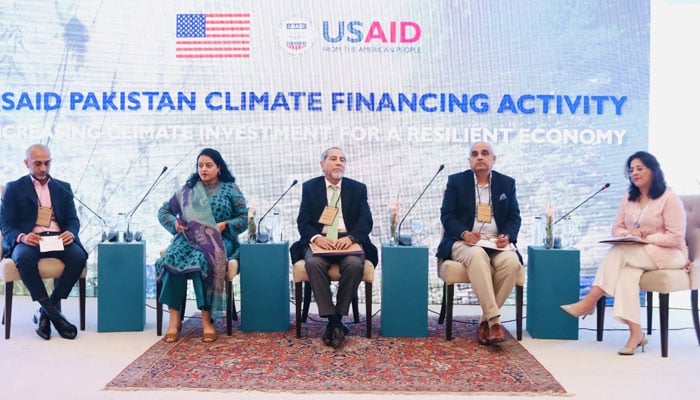 Participants speak during a launching ceremony of the Pakistan Climate Financing Activity organized by the United States Agency for International Development (USAID) Pakistan on April 17, 2024. — Facebook/USAID Pakistan