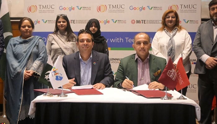 Dr Faisal Mushtaq Founder & CEO of Roots Millennium Education Group (R) and  Umar Farooq CEO of Tech Valley Signs an agreement during a signing ceremony on April 17, 2024. — Facebook/The Millennium Education Pakistan Official