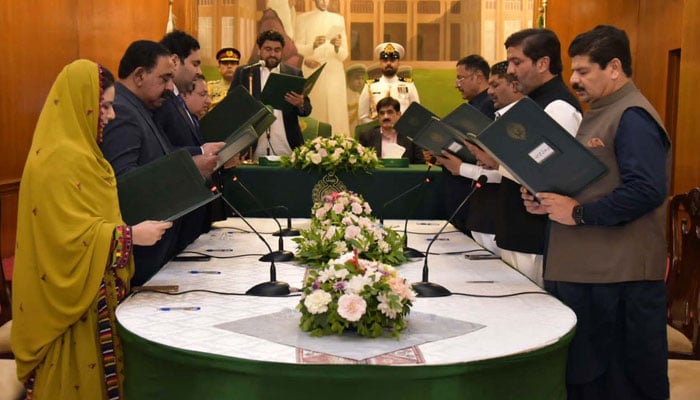 Sindh Governor, Kamran Khan Tessori administers oath to the newly appointed ministers during the oath-taking ceremony at the Governor House in Karachi on April 17, 2024. — PPI