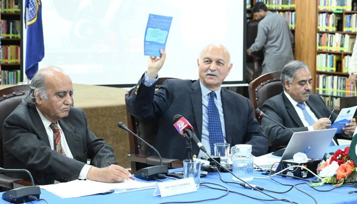 Senior politician Mushahid Hussain Sayed gestures during a meeting. — APP/File