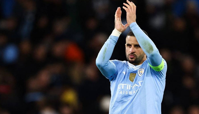 Manchester Citys English defender Kyle Walker reacts at the UEFA Champions League quarter-final second-leg football match between Manchester City and Real Madrid, at the Etihad Stadium, in Manchester, north-west England, on April 17, 2024. — AFP