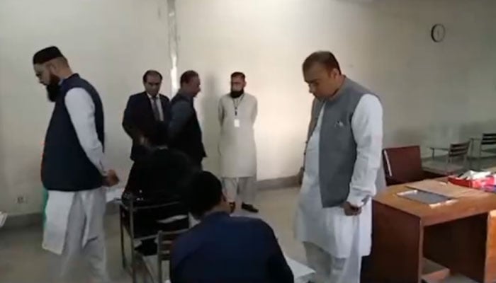 Chairman Board of Intermediate and Secondary Education (BISE) Lahore M Ali during inspection of the examination centre at Lawrence Road on April 19, 2024. — Screengrab/Facebook/Commissioner Lahore, Punjab.