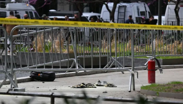 Fire extinguishers (R) are left at the park across from Manhattan Criminal Court in New York City after a man reportedly set himself on fire during the trial of former U.S. President Donald Trump, in New York City on April 19, 2024. — AFP