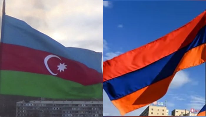 Flags of Azerbaijan (L) and Armenia can be seen. — AFP/File