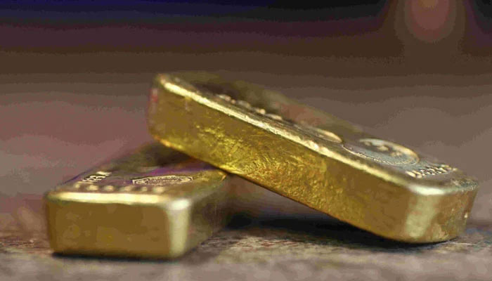 Gold bars can be seen in this image. — AFP/File