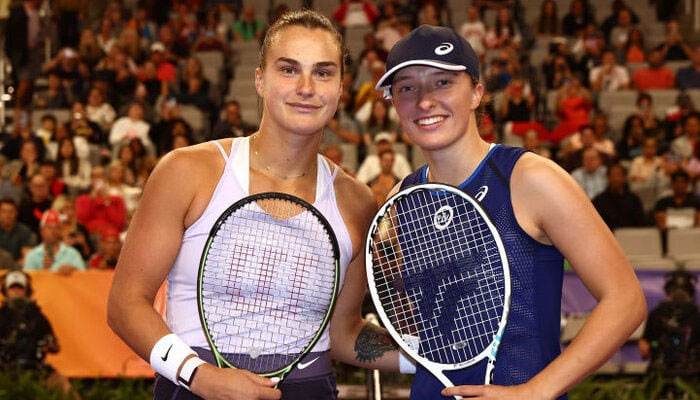 This photo shows tennis players Aryna Sabalenka (L), and Iga Swiatek. — AFP/File