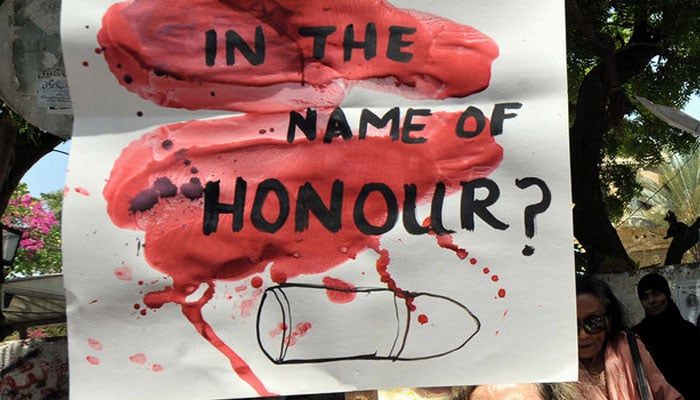 Pakistani human rights activists shout slogans during a protest in Karachi against honour killings. — AFP/File