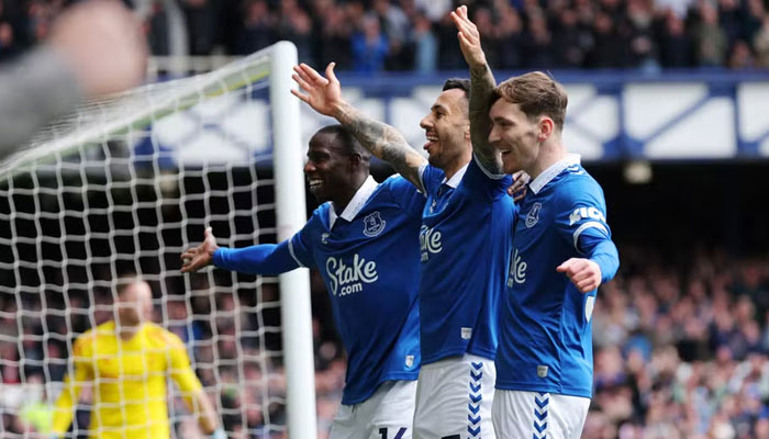 Everton players celebrate during the match. — AFP/File