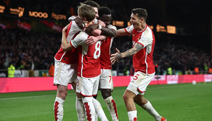 Arsenal F.C.Arsenals midfielder Martin Odegaard (centre) celebrates with teammates after scoring their second goal against Wolverhampton Wanderers. — AFP/File