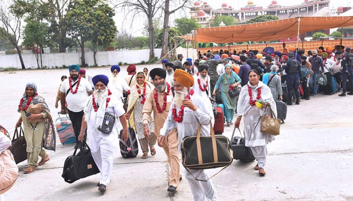 Sikh pilgrims from India can be seen at the India-Pakistan Wagah Border crossing on April 13, 2024. — APP