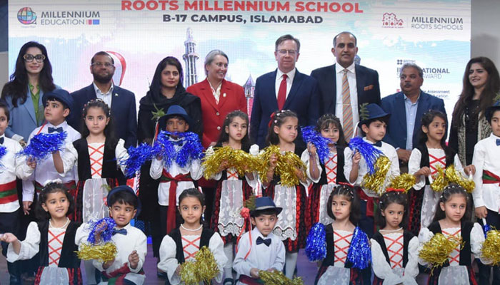 Ambassador of Poland in Pakistan Maciej Pisarski pose for a group photo with others during the inauguration ceremony of the iconic purpose-built Roots Millennium Campus at Multi Gardens B-17, Islamabad on April 21, 2024. — Facebook/Chaudhry Faisal Mushtaq