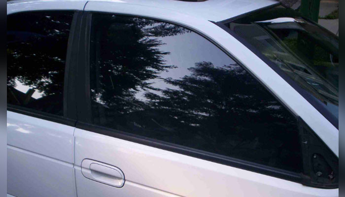 This image shows a tinted glass car. — APP/File
