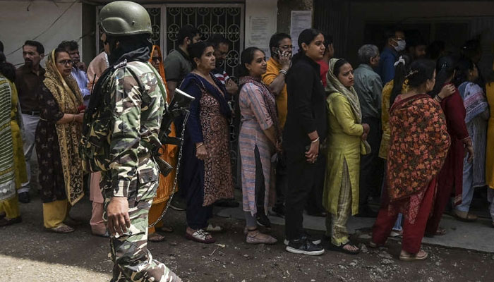 Women can be seen queuing to cast their votes in India. — AFP/File