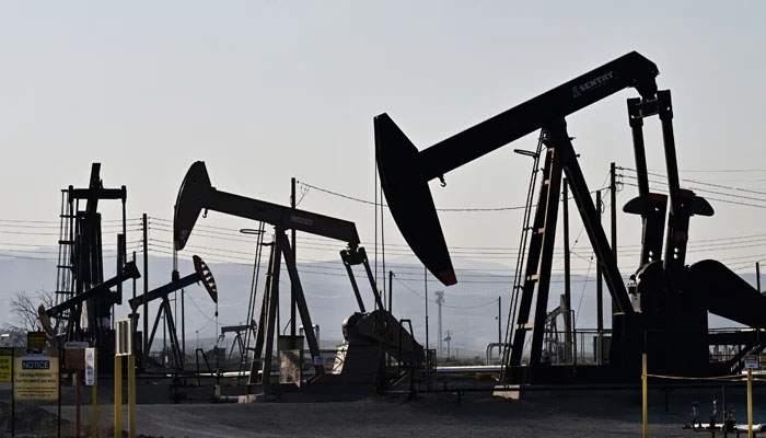 Working oil pumpjacks on the outskirts of Maricopa in Kern County, California, on September 21, 2023. — AFP