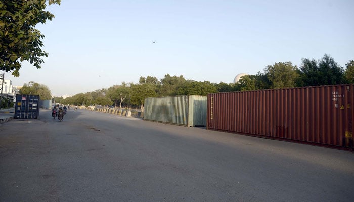 Containers are being placed for security arrangements on the arrival of Iranian President Dr Ebrahim Raisi, at Jinnah Mausoleum in Karachi on April 22, 2024. — PPI