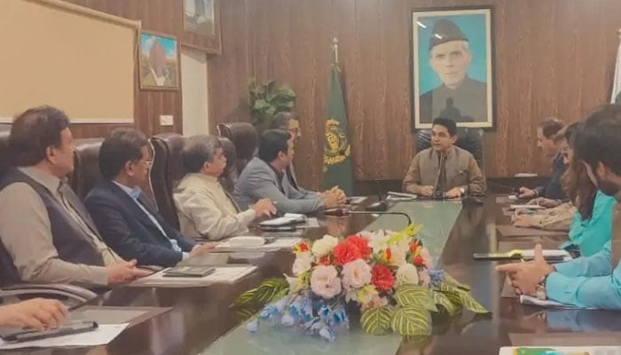 The image released on Oct 30, 2023 shows Federal Government Employees Housing Authority Director General Captain (retd) Zafar Iqbal in a meeting. — Facebook/FGE Housing Authority