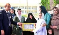 Iranian president’s wife visits centre for orphan children