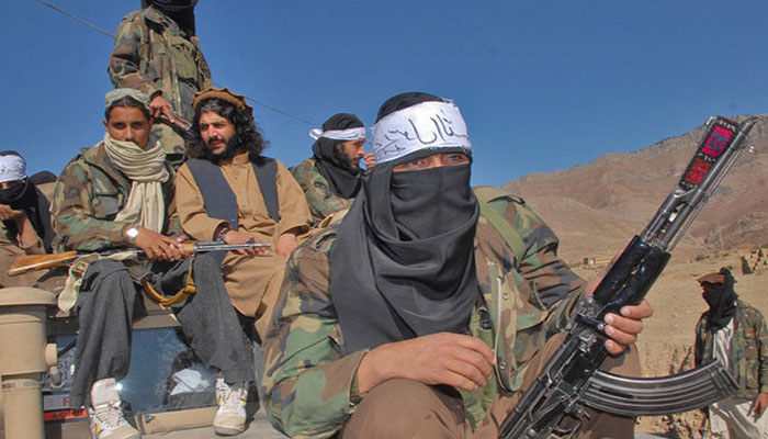 Armed militants of the banned Tehreek-e-Taliban Pakistan (TTP) pose for a photograph in Orakzai Agency. — AFP/File
