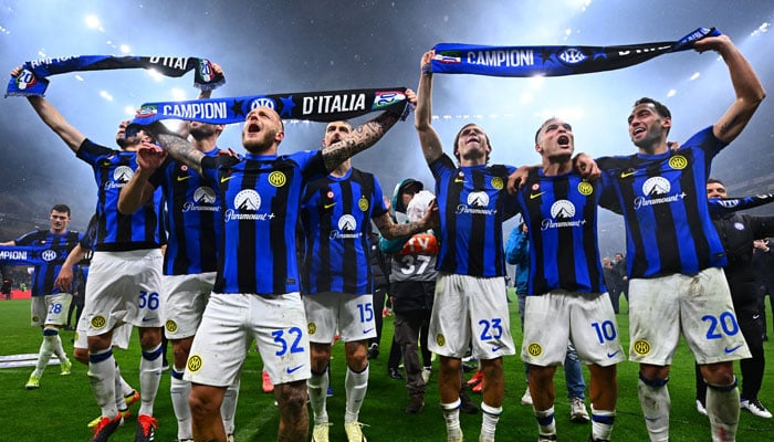 Inter Milan players can be seen celebrating after winning the Serie A title in this image released on April 23, 2024. — X/@Inter_en