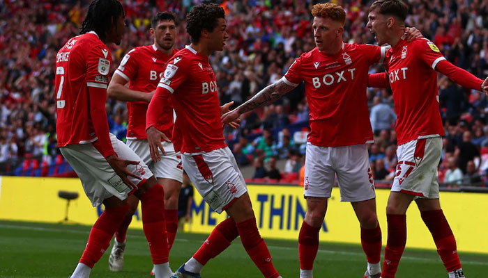 Nottingham Forest players celebrate the goal that took them back to Premier League. — AFP File