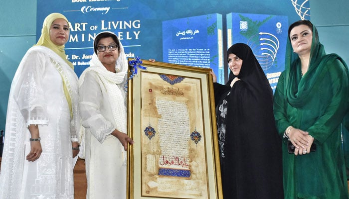 Ms Dr Jamila Alam Al Hoda, wife of the Honorable President of the Islamic Republic of Iran receives a souvenir during her visit to Pakistan Home at the University of Home Economics, Gulberg on April 23, 2024. — APP